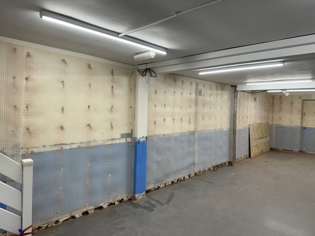 Ashington Sea Cadets: wall lining during the work